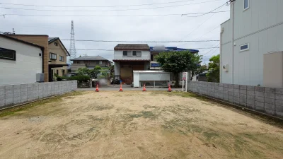 松山市保免西三丁目677番7の売土地 敷地奥側から前面道路方向を見た現地全景 Land view物件情報掲載用写真